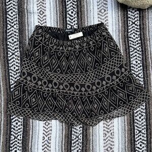 Black Patterned flowy mini skirt
